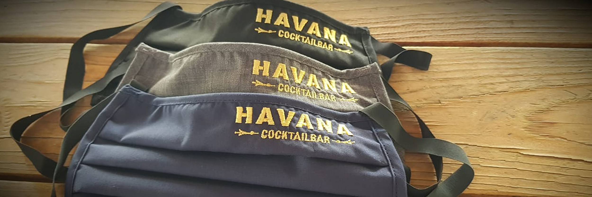 Gesichtsmasken mit Havana Cocktailbar Schrift